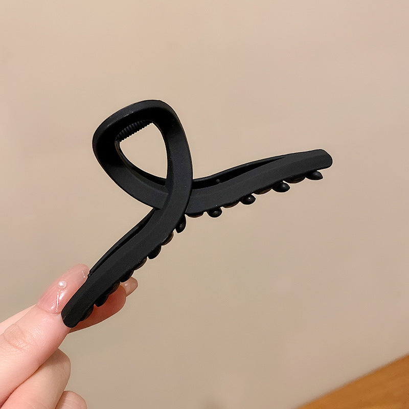 Take A Bath Plate, Hair Clip, The Back Of The Woman's Head