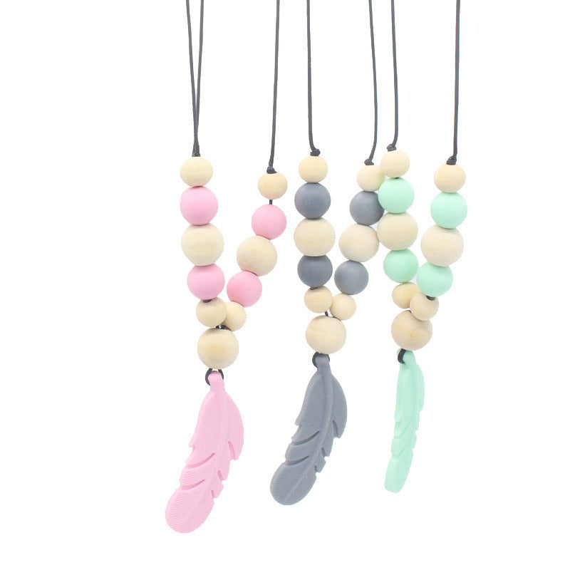 FeatherBite™ Baby Silicone Necklace – Soothing Teething Relief
