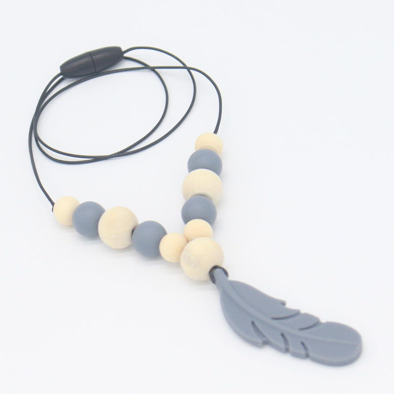 FeatherBite™ Baby Silicone Necklace – Soothing Teething Relief