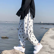 Men’s Korean Trend Nine-Point Loose Guard Pants – Spring Casual Trousers