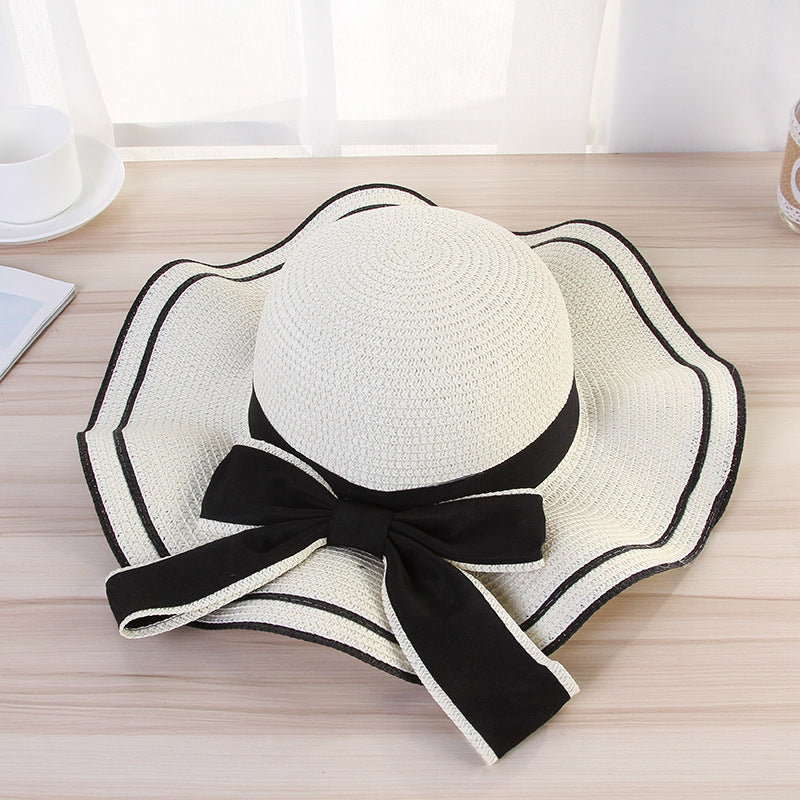 Women's Foldable Straw Sun Hat with Bow for Beach and Travel