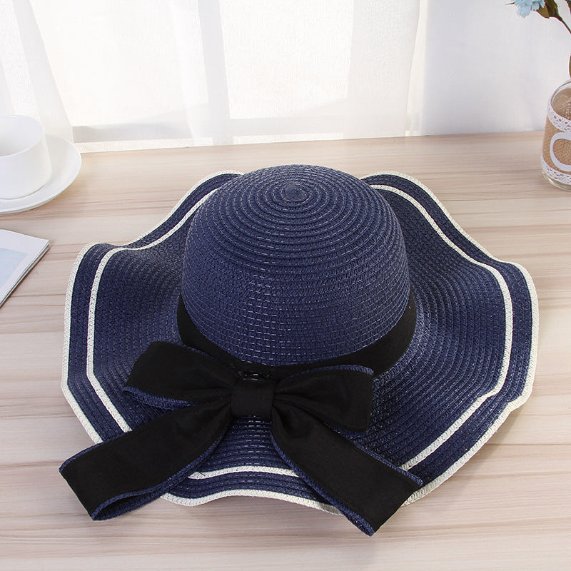 Women's Foldable Straw Sun Hat with Bow for Beach and Travel