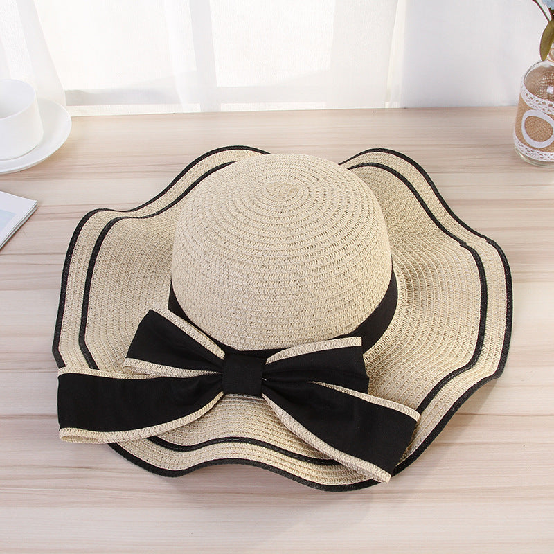 Women's Foldable Straw Sun Hat with Bow for Beach and Travel