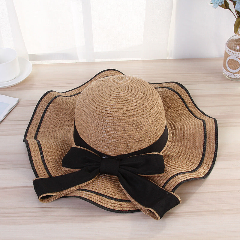 Women's Foldable Straw Sun Hat with Bow for Beach and Travel