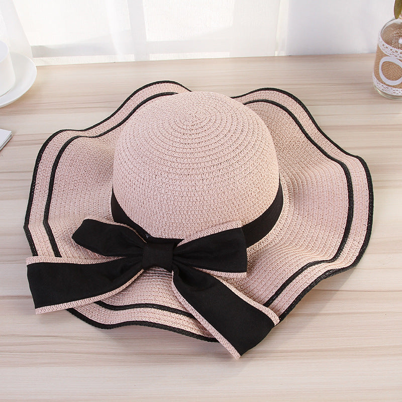 Women's Foldable Straw Sun Hat with Bow for Beach and Travel