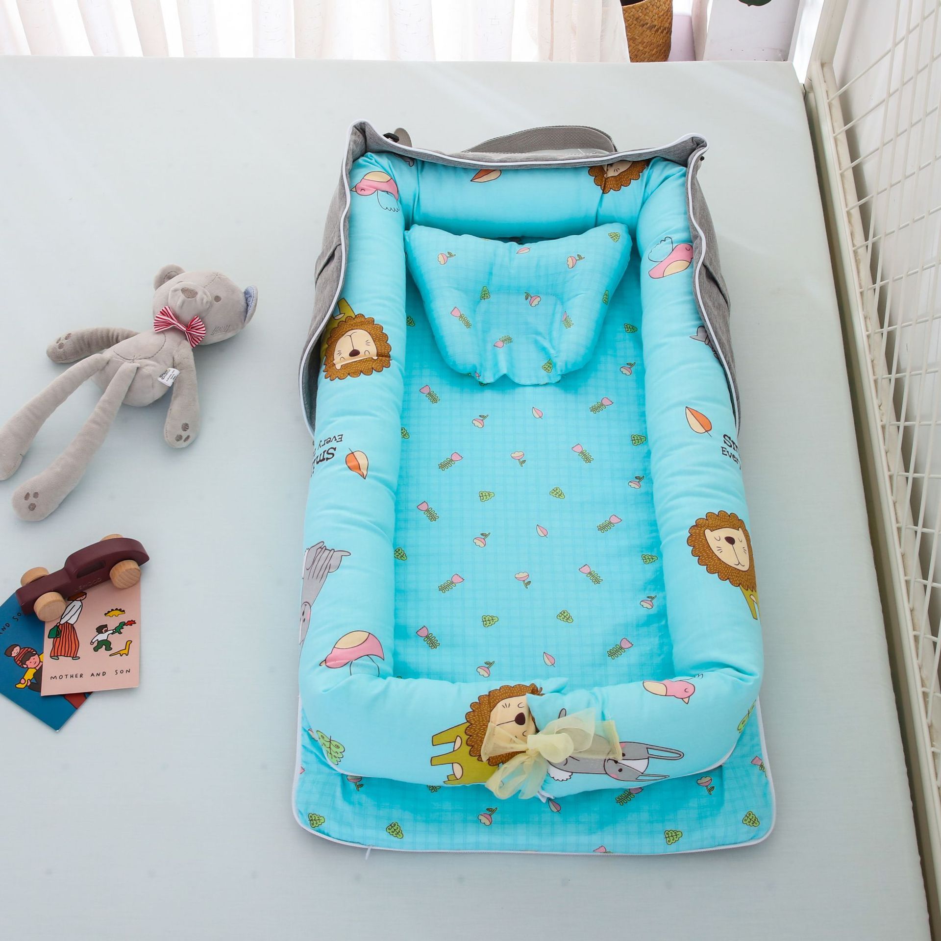 Portable Foldable Cotton Baby Bed – Travel Bassinet with Carry Bag