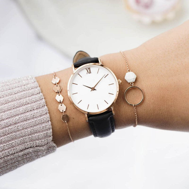 Elegant Frosty Round Dial Women's Quartz Watch with Textile Strap