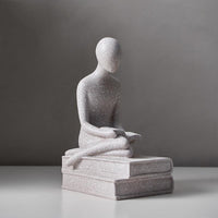 Sitting book reading grey