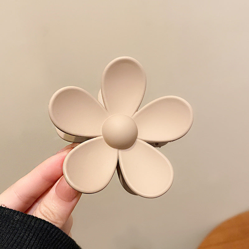 Take A Bath Plate, Hair Clip, The Back Of The Woman's Head