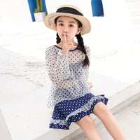 Blue and white dot girl