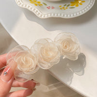 Mesh rose spring clip