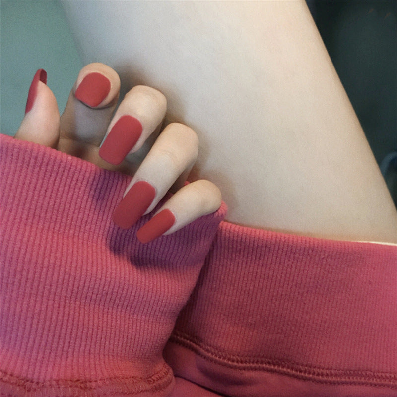 Finished Manicure with False Nails