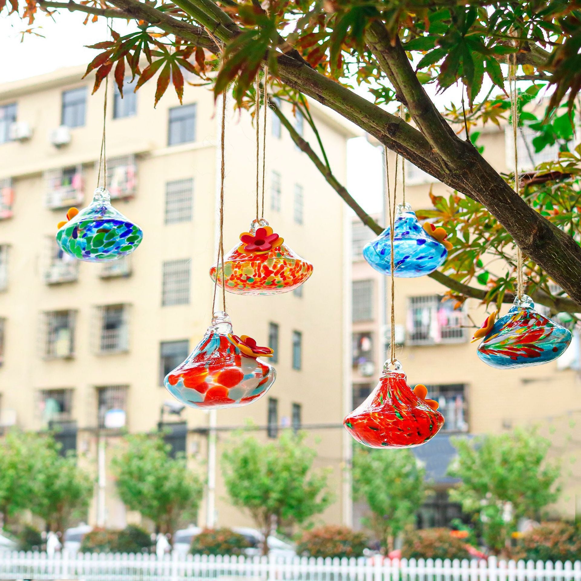 One Outdoor Courtyard With Glass Bird Feeder