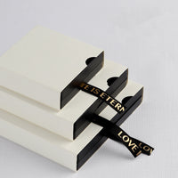 White sleeve with ribbon