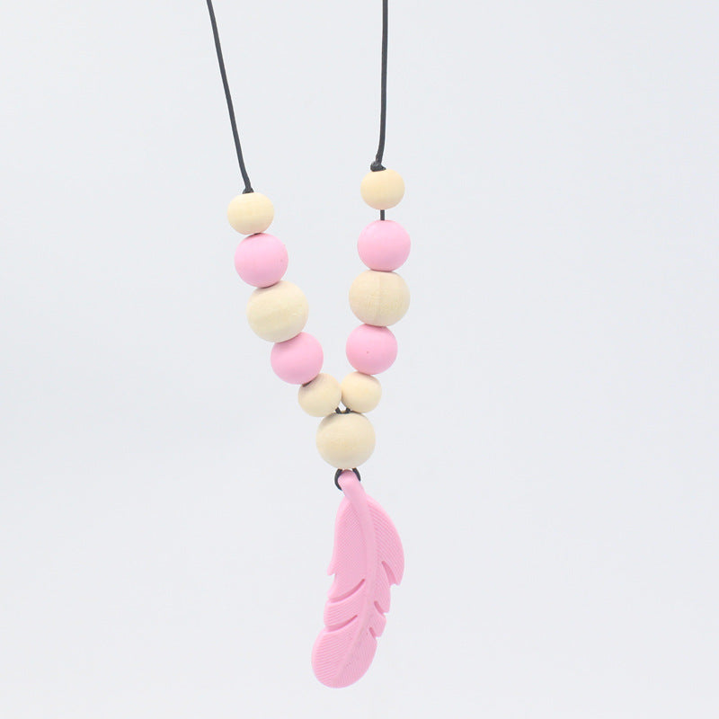 FeatherBite™ Baby Silicone Necklace – Soothing Teething Relief