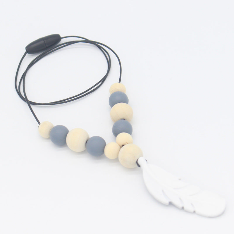 FeatherBite™ Baby Silicone Necklace – Soothing Teething Relief