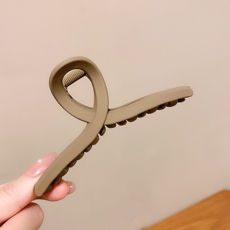 Take A Bath Plate, Hair Clip, The Back Of The Woman's Head