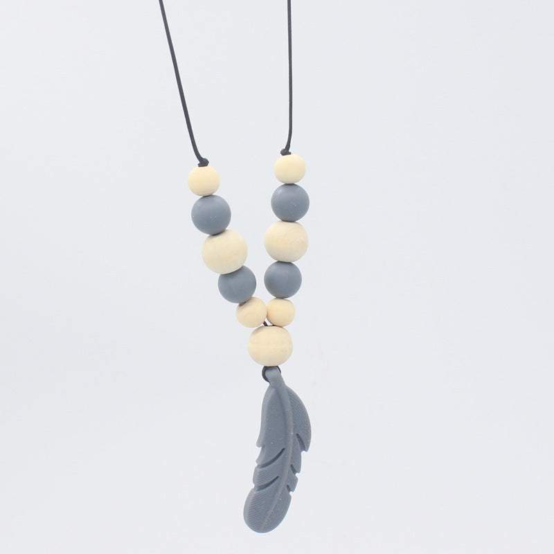 FeatherBite™ Baby Silicone Necklace – Soothing Teething Relief