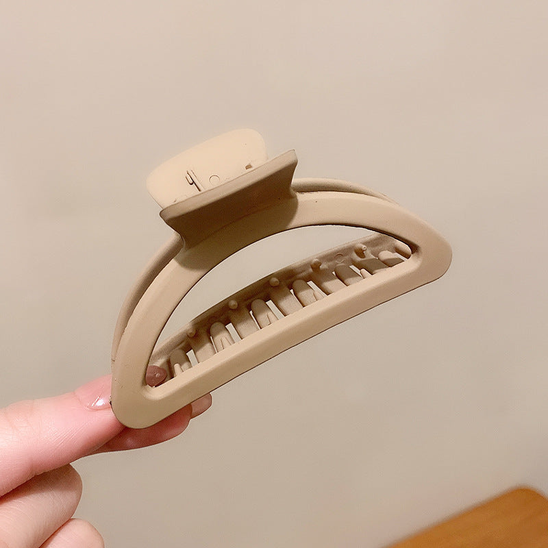 Take A Bath Plate, Hair Clip, The Back Of The Woman's Head