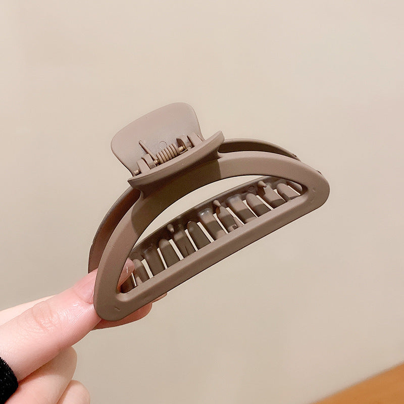 Take A Bath Plate, Hair Clip, The Back Of The Woman's Head